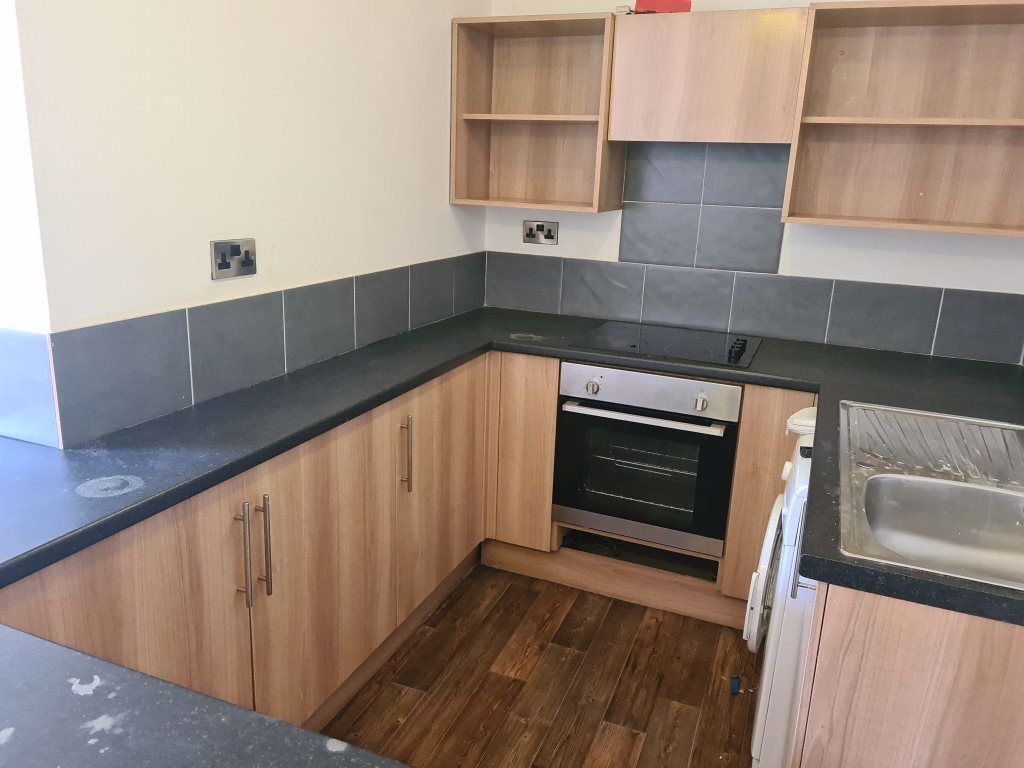 Property photo 1 of 10 Modern Kitchen With Wood Finish Cabinets, Integrat...