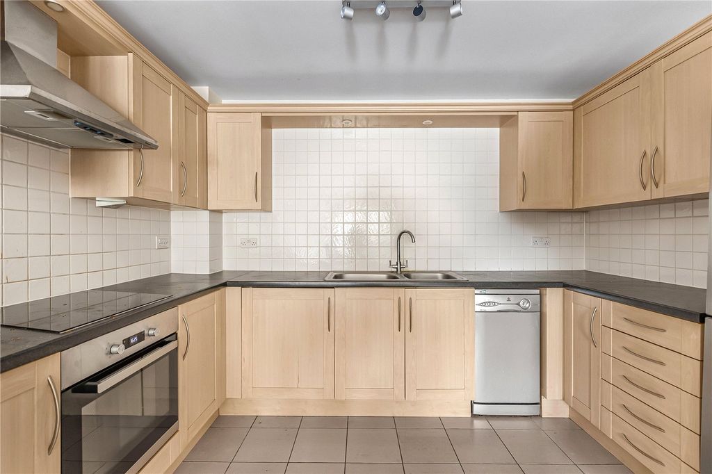 Property photo 3 of 11 Kitchen Area