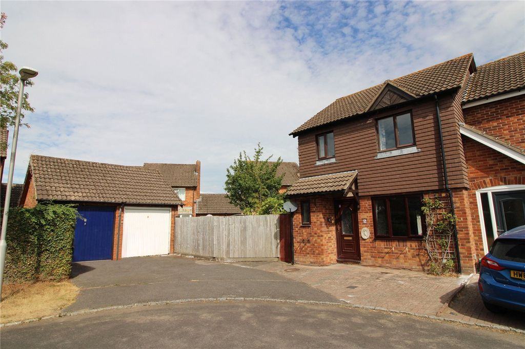 Property photo 1 of 14 Garage & Driveway