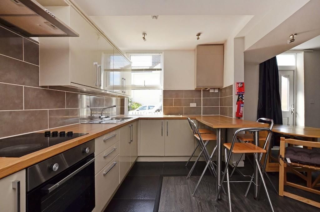 Property photo 2 of 9 Bright And Modern Kitchen Featuring Ample Countert...