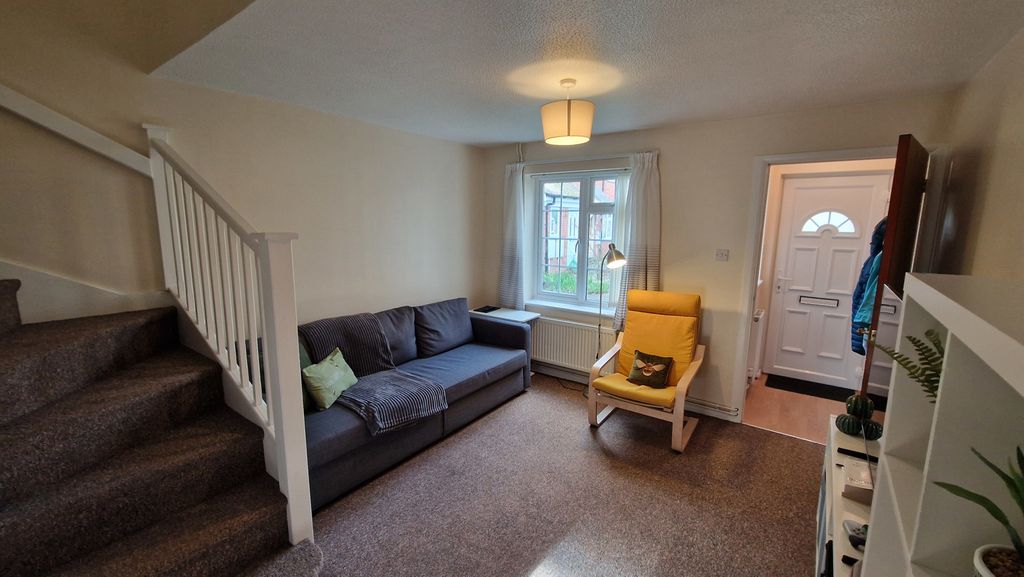 Property photo 3 of 16 Living Room From Kitchen Door