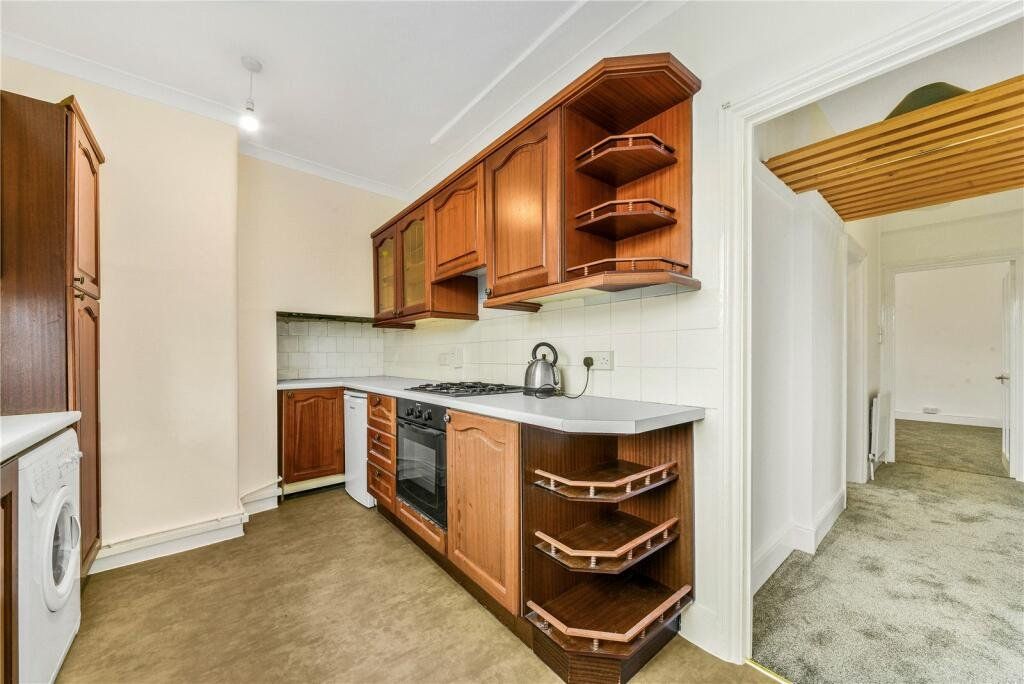 Property photo 3 of 8 Kitchen