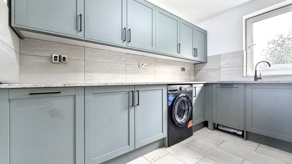 Property photo 1 of 5 Bright Modern Utility-Style Kitchen With Soft Blue...