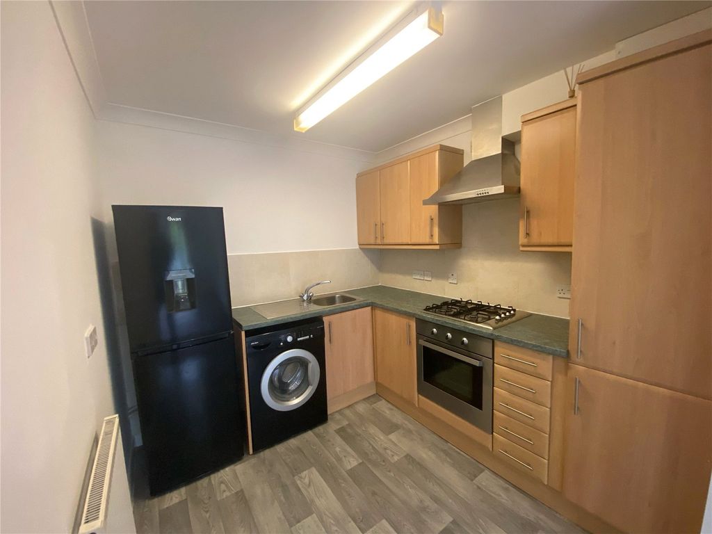 Property photo 2 of 6 Kitchen
