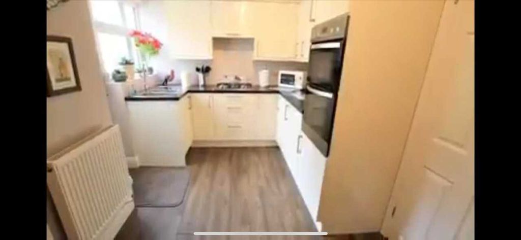 Property photo 2 of 12 Kitchen