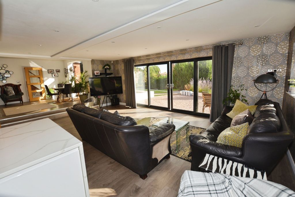 Property photo 3 of 35 Family Room Dining Area