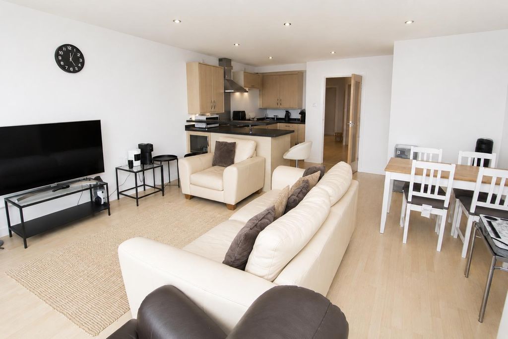 Property photo 2 of 9 Bright, Open-Plan Lounge And Dining Area...