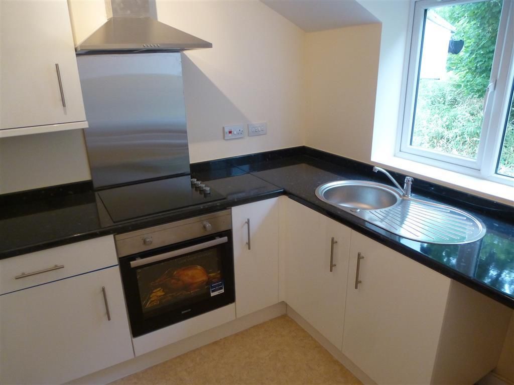 Property photo 3 of 8 Kitchen