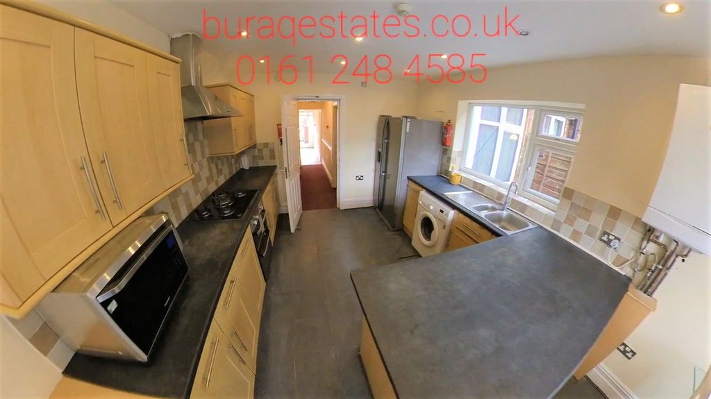Property photo 3 of 15 Bright Modern Kitchen With Light Wood Cabinets, In...