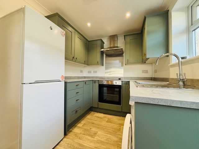 Property photo 3 of 12 Kitchen