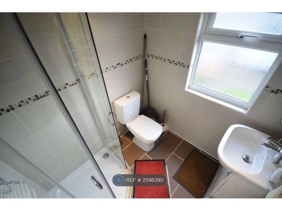 Property photo 2 of 5 Wash Room With Shower, Toilet And Wash Basin