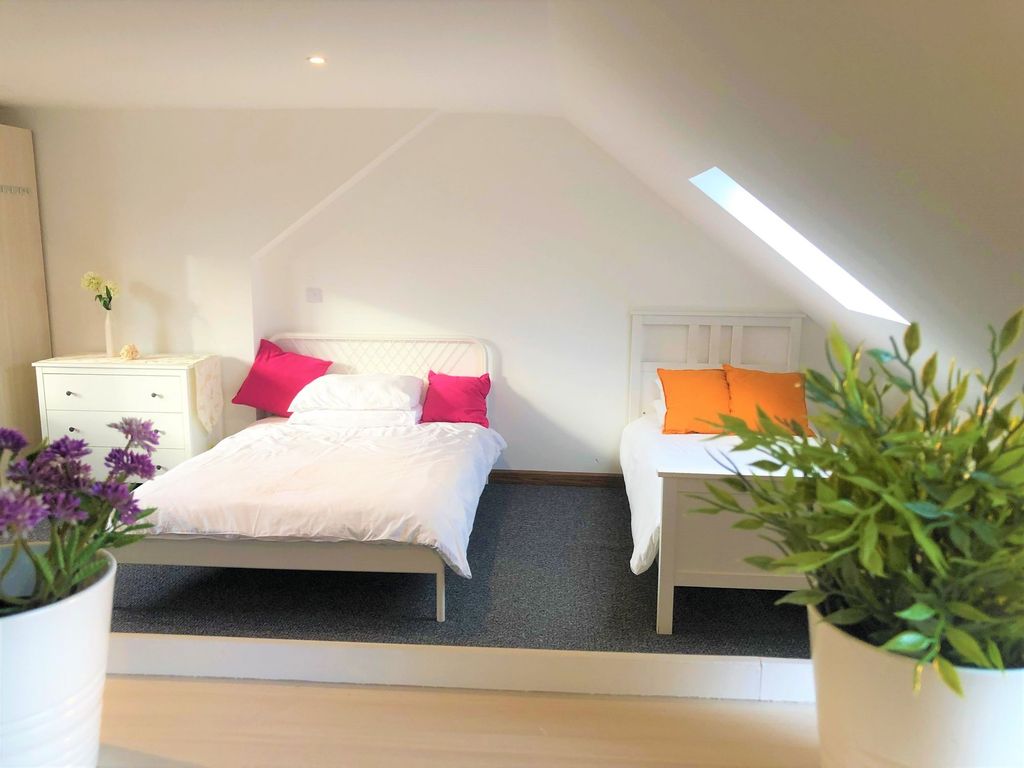Property photo 3 of 12 Bright And Clean Double Bedroom Featuring Two Beds...