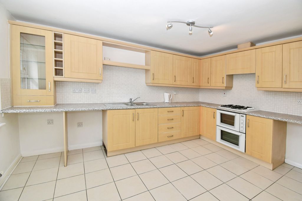 Property photo 2 of 17 Kitchen Area