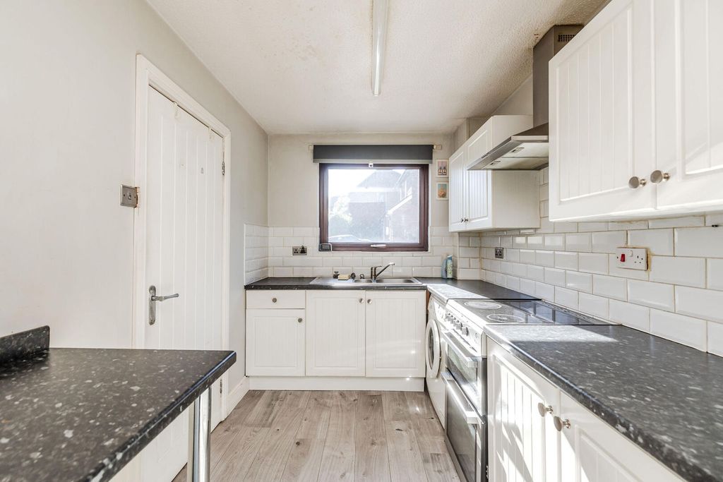 Property photo 3 of 12 Kitchen