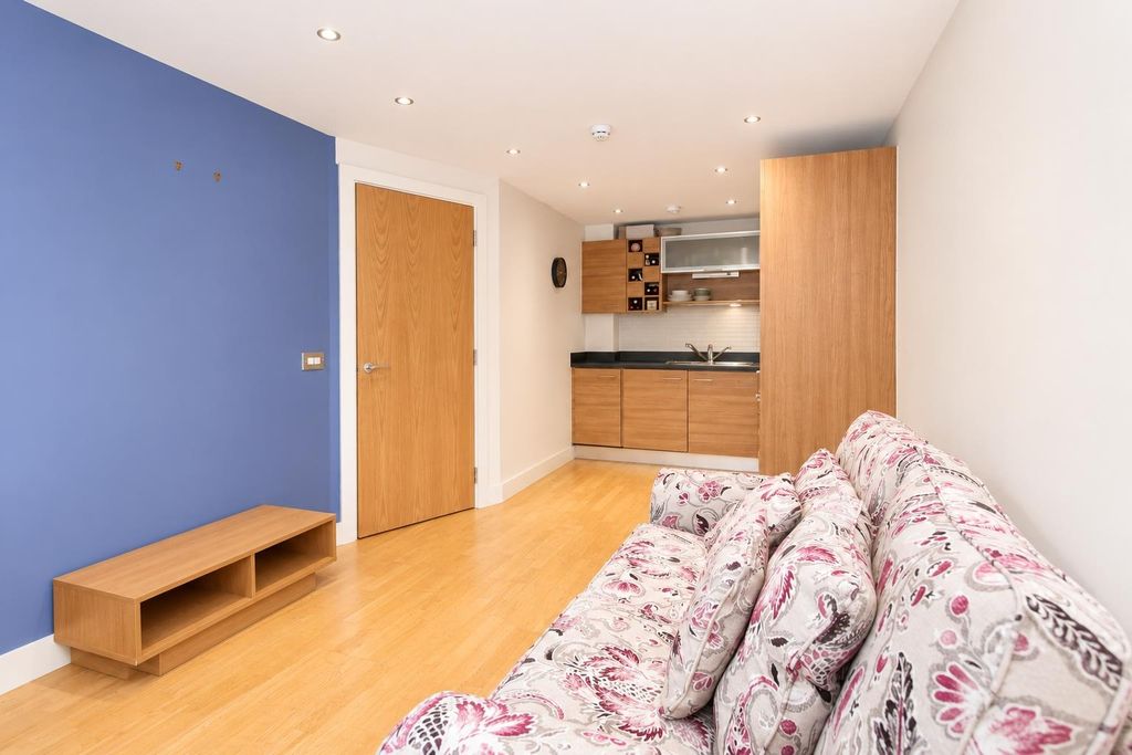Property photo 3 of 8 Bright Modern Living Area With Integrated Kitchen...