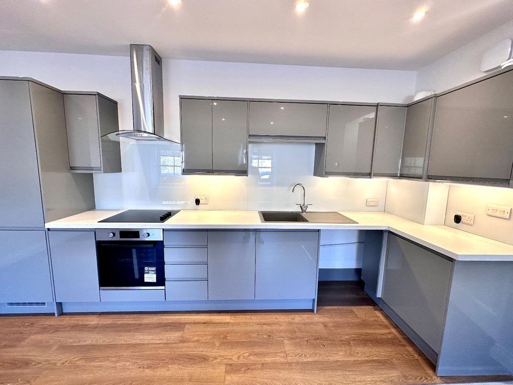 Property photo 3 of 8 Kitchen Area