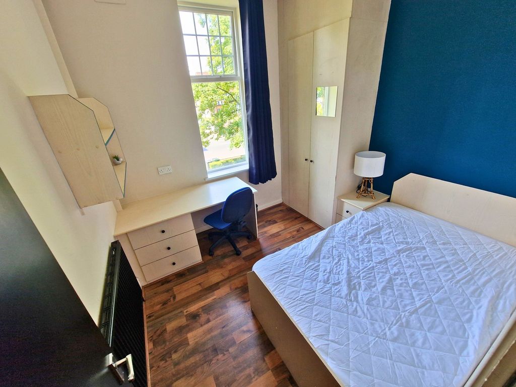 Property photo 2 of 20 Bright, Well-Furnished Bedroom Featuring A Comfort...