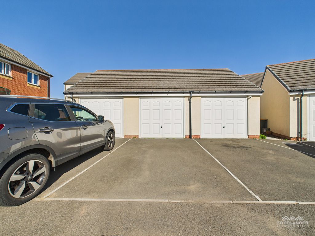 Property photo 2 of 13 Garage