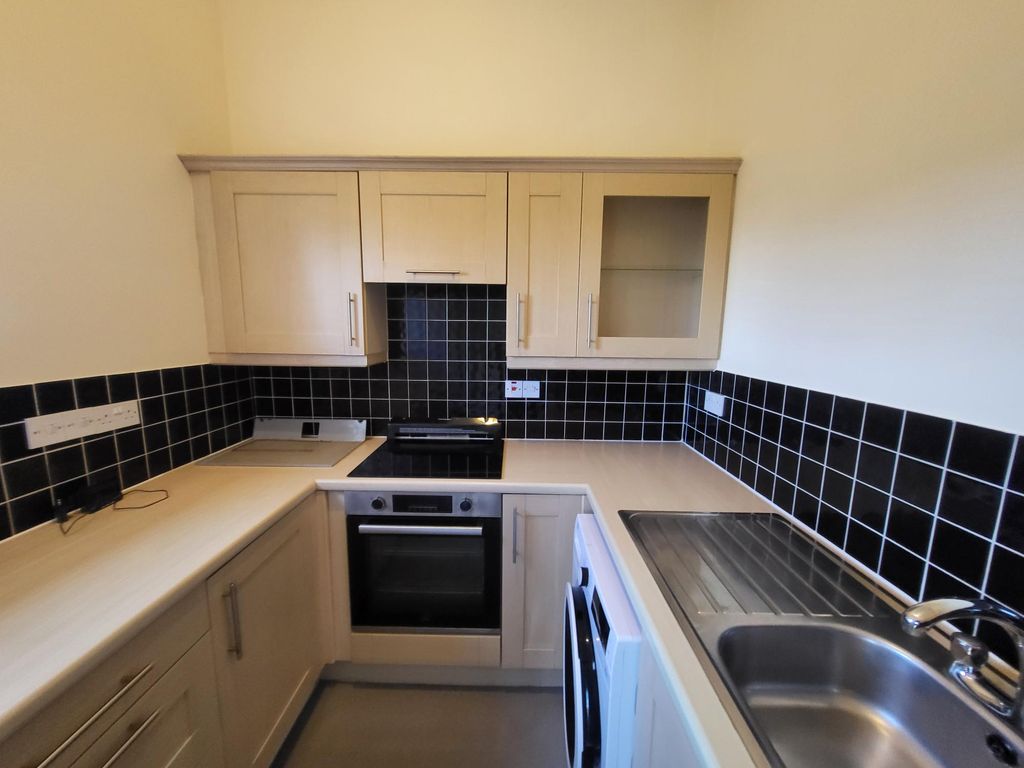 Property photo 2 of 7 Kitchen