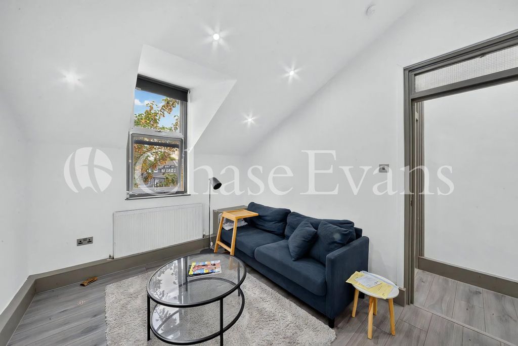 Property photo 1 of 10 Living Area