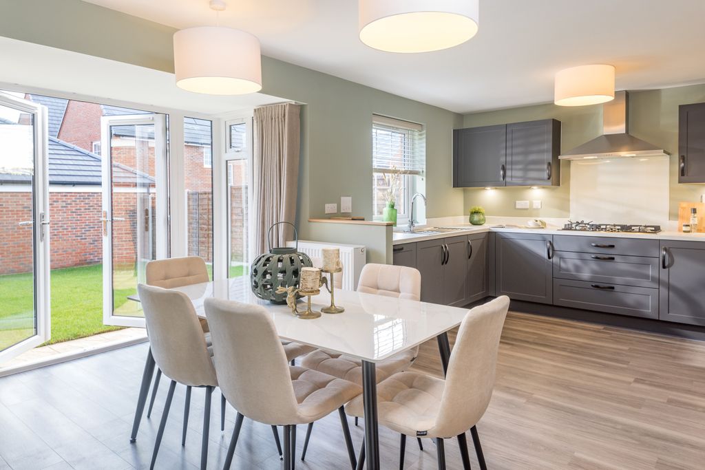 Property photo 2 of 10 Kitchen And Dining Room In The 4 Bedroom Culver At Finchwood Park