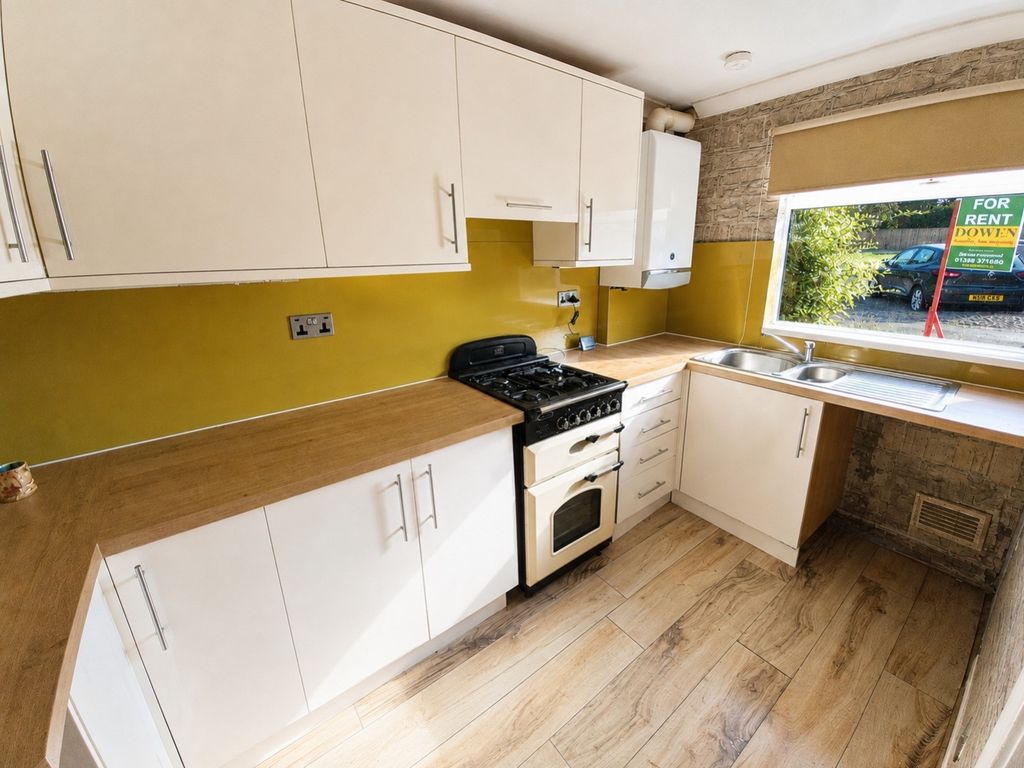 Property photo 3 of 9 Kitchen