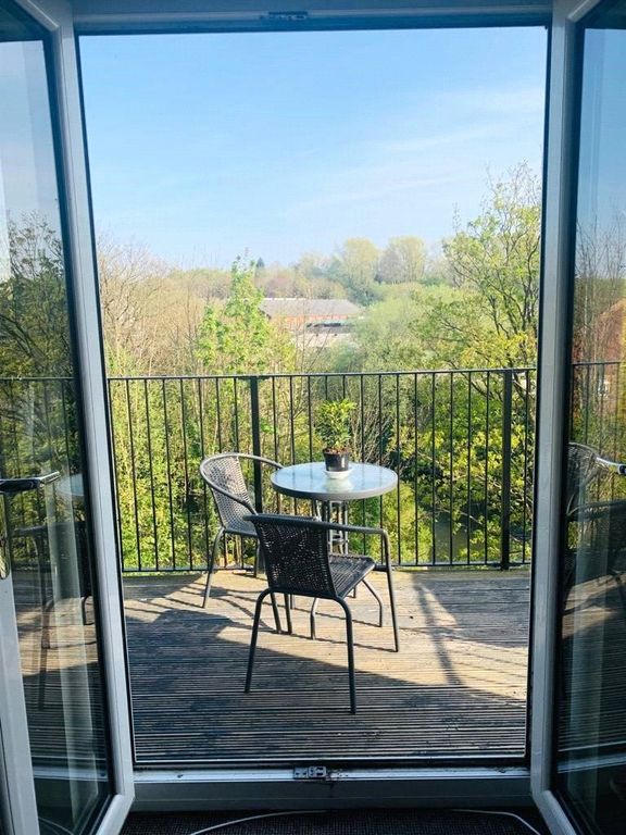 Property photo 2 of 13 Balcony