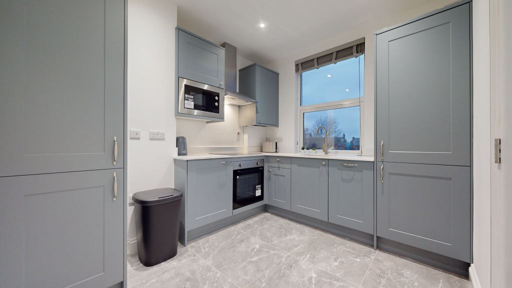 Property photo 2 of 12 Kitchen