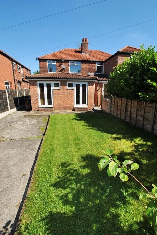 Property photo 2 of 14 A Well-Maintained Garden With A Lush Green Lawn Bo...