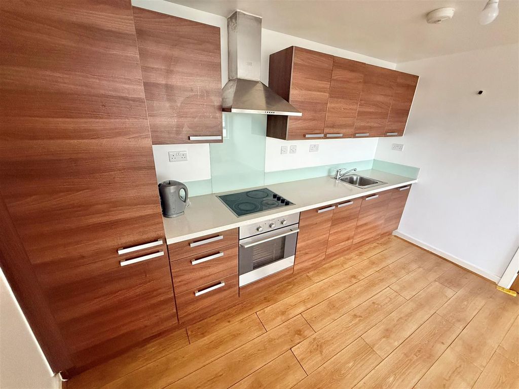 Property photo 1 of 6 Kitchen Area