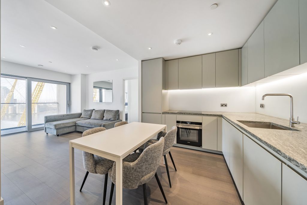 Property photo 1 of 11 Kitchen &amp; Open Living.Jpg