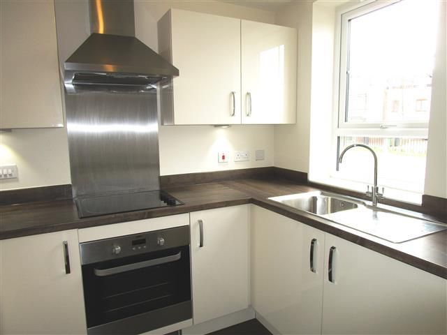 Property photo 3 of 8 Kitchen