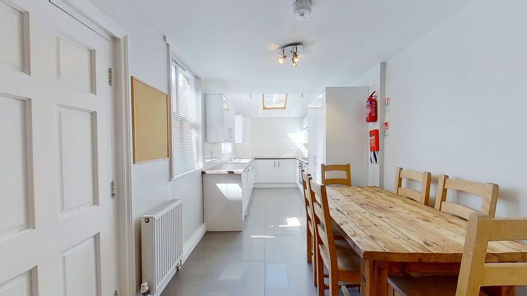 Property photo 2 of 10 Bright, Modern Open-Plan Kitchen And Dining Area W...