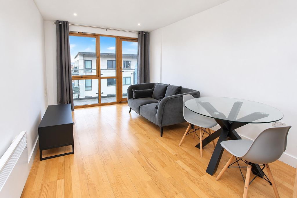 Property photo 1 of 8 Bright Modern Living Room With Large Windows...