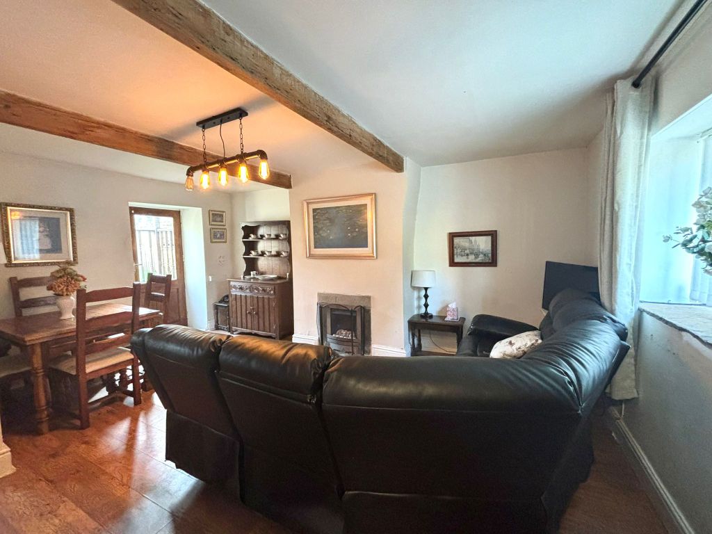 Property photo 3 of 12 Living Room 1