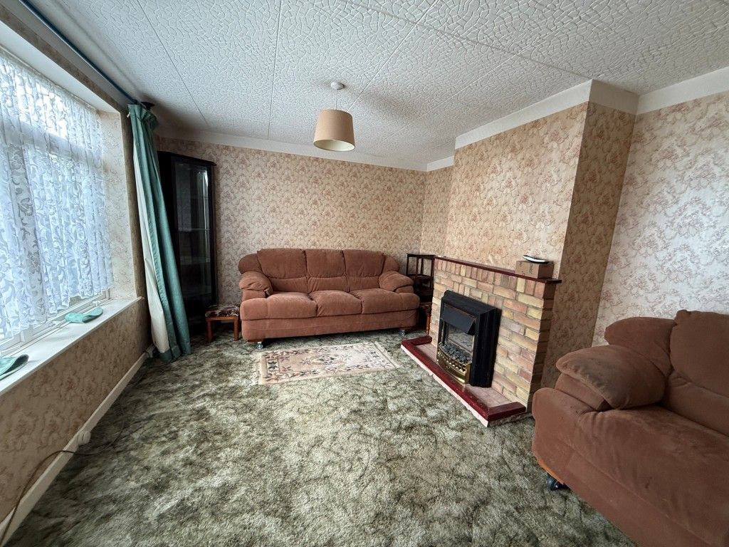 Property photo 2 of 17 Living Room With Fireplace And Window To Front