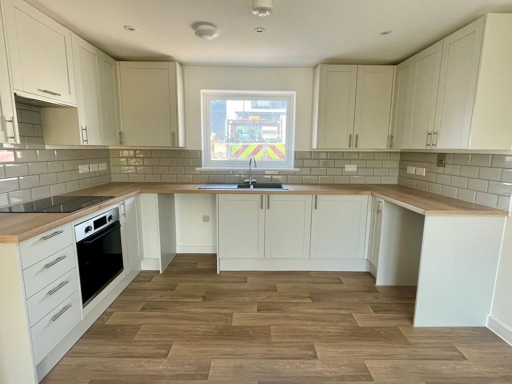 Property photo 3 of 11 Sample Kitchen