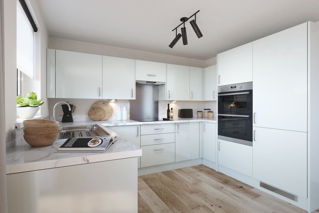 Property photo 2 of 11 Modern Three-Sided Kitchen With Ample Storage Space