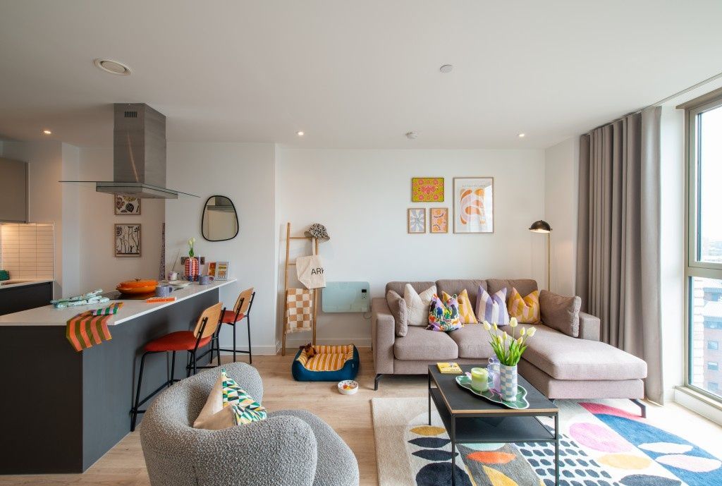 Property photo 1 of 12 Bright And Stylish Living Room Featuring A Comfort...