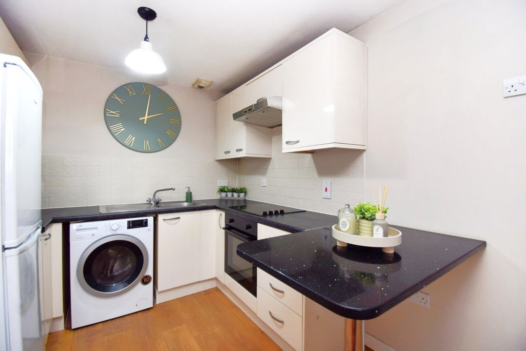 Property photo 3 of 13 Kitchen