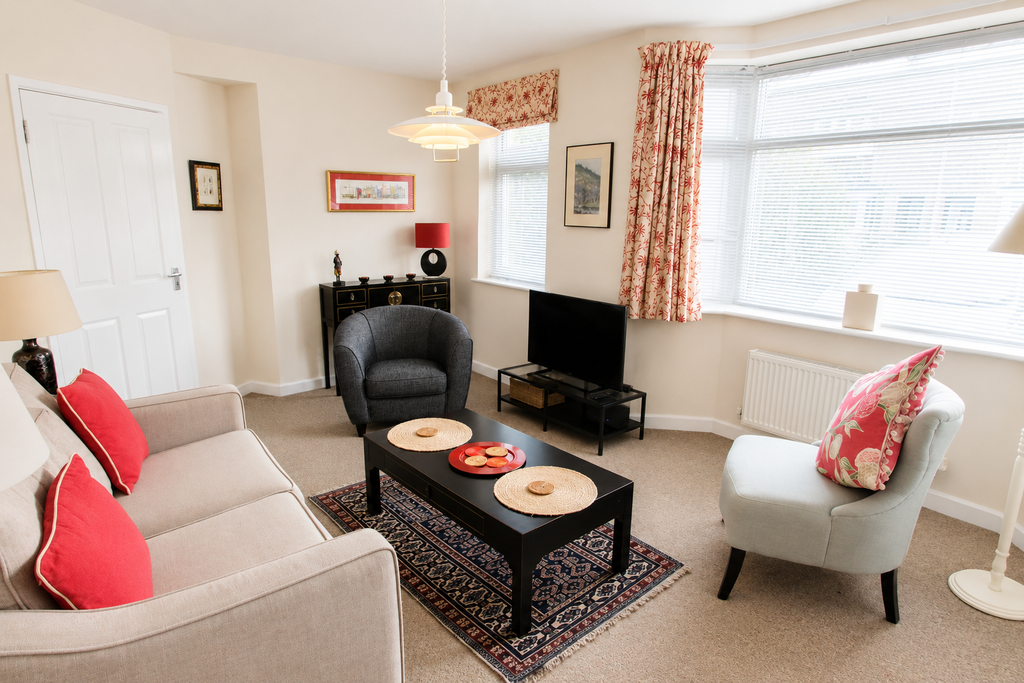 Property photo 1 of 8 Living Room - Angle 1