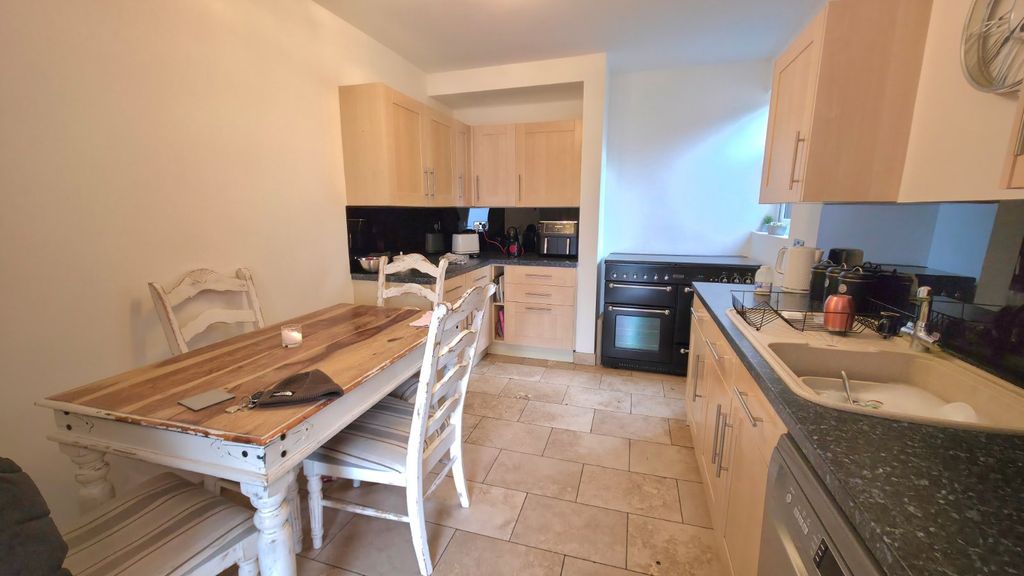 Property photo 3 of 18 Dining Kitchen