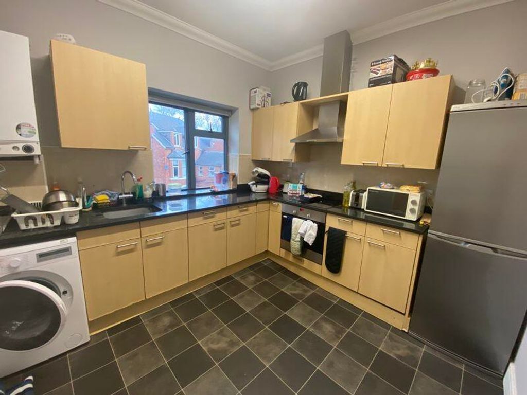 Property photo 3 of 6 A Bright And Functional Kitchen With Ample Storage...