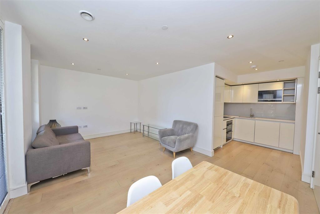 Property photo 2 of 11 Dining/Living/Kitchen