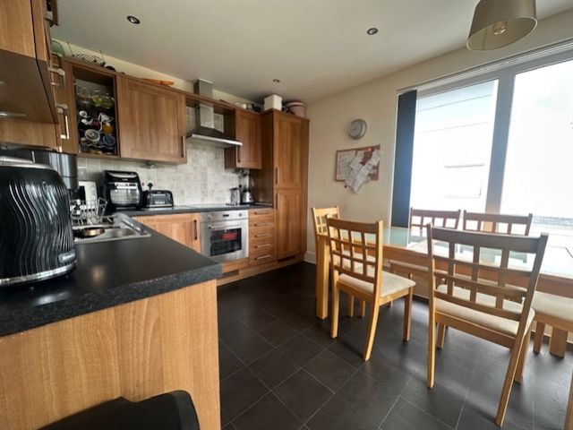 Property photo 3 of 10 Kitchen Dining Room