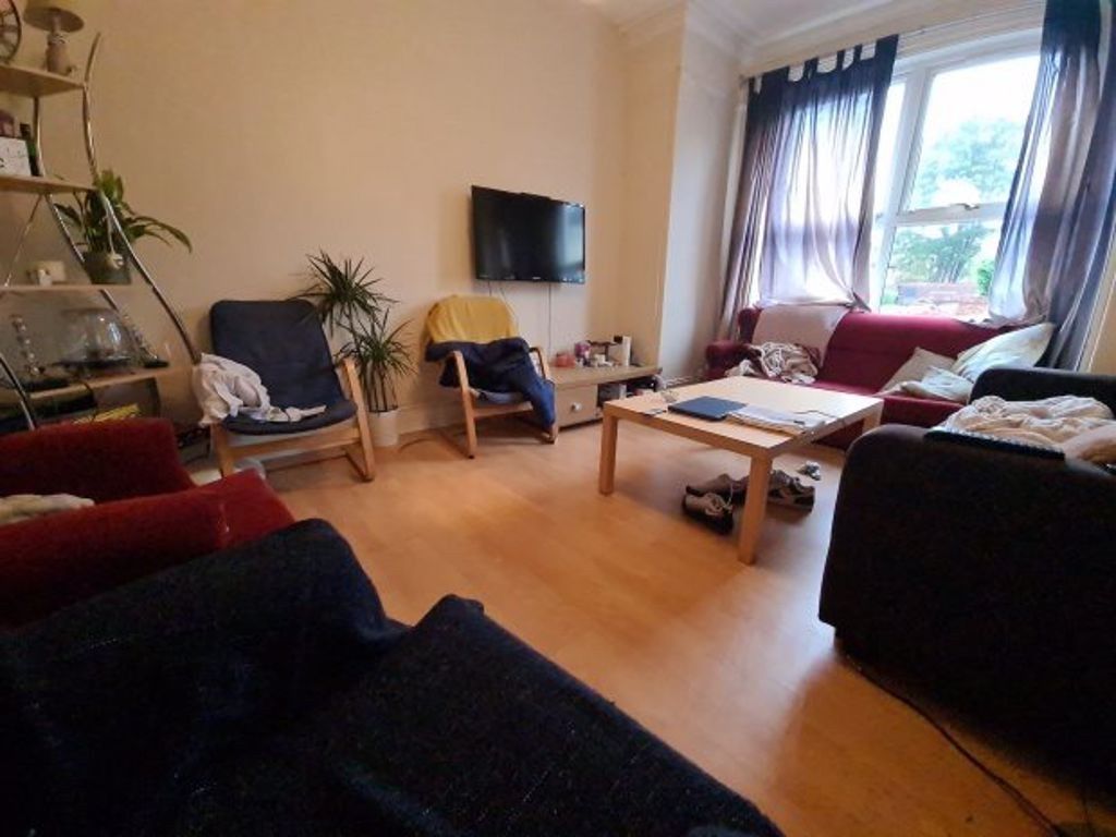 Property photo 3 of 14 Bright And Welcoming Living Area Featuring Comfort...