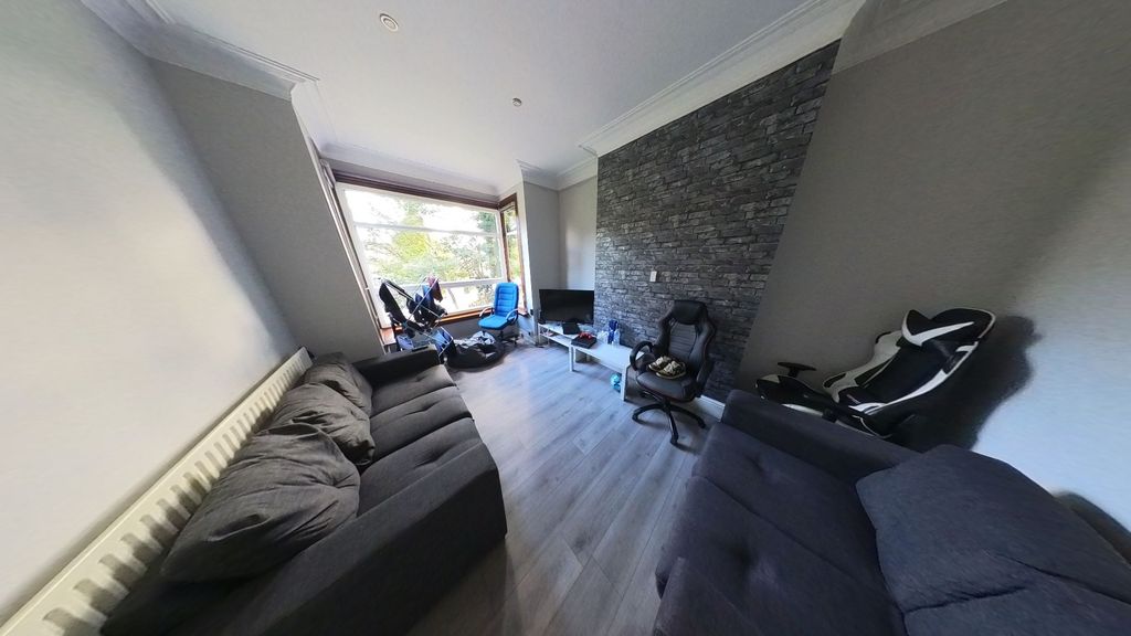 Property photo 1 of 15 A Contemporary Living Room Featuring Comfortable S...