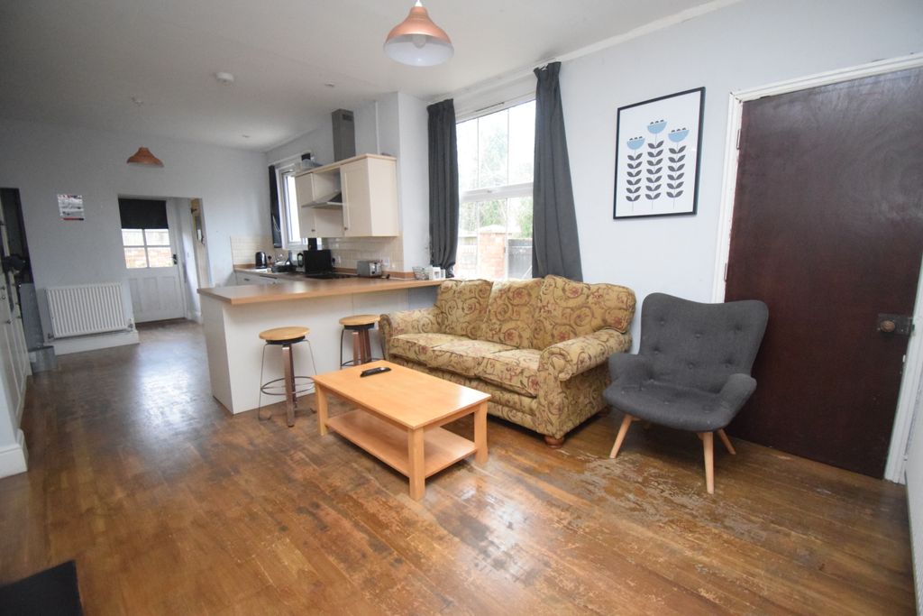 Property photo 3 of 8 Living Area