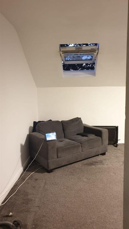 Property photo 3 of 9 Cozy Lounge Area With A Comfortable Two-Seater Sof...