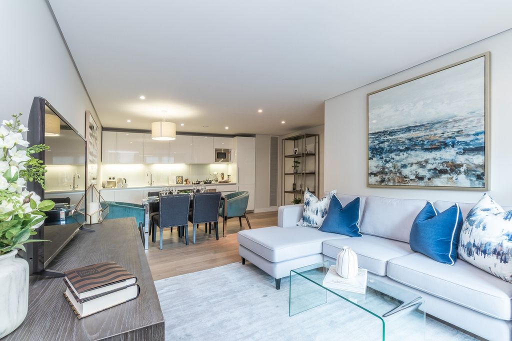 Property photo 1 of 13 This Stylish Living Room Boasts Contemporary Desig...
